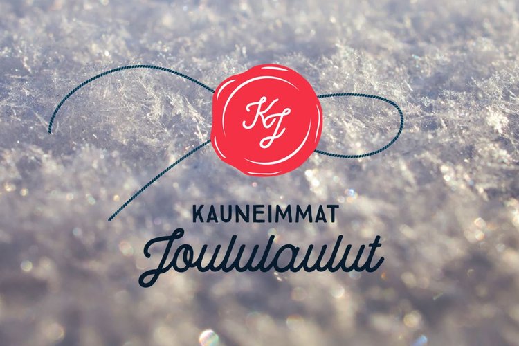 Kauneimmat joululaulut -logoteksti ja lunta taustalla